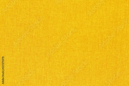Yellow golden fabric cloth texture background, seamless pattern of natural textile