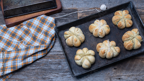 Pumpkin shaped biscuits stuffed with fresh parmesan cheese, basil pesto, spicy Italian meatballs.