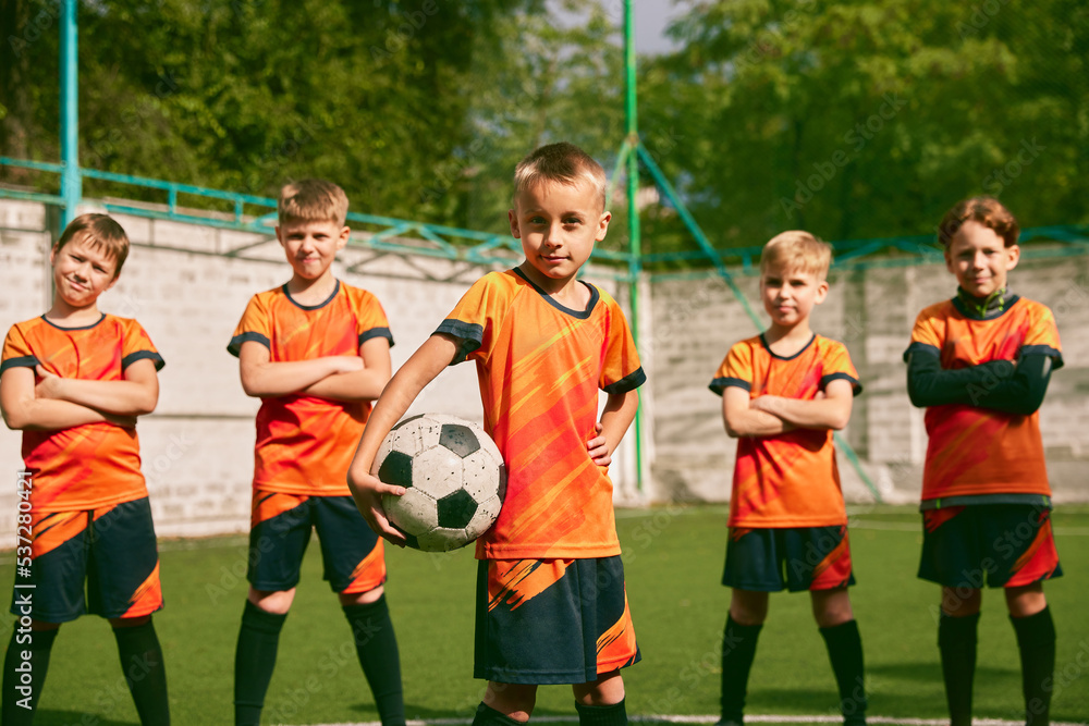 Future Football Champions Little Boys Kids In Sports Uniform Posing future-football-champions-little-boys-kids-in-sports-uniform-posing