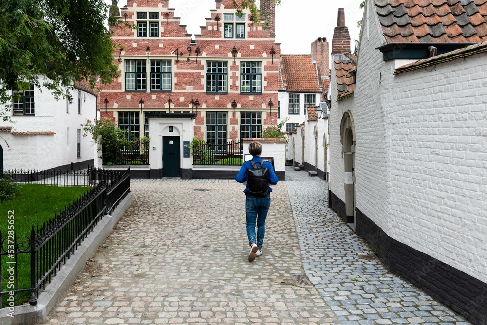 Kortrijk, West Flanders Region - Belgium -  White painted brick stone facades of the beguinage