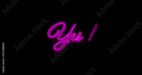 Image of neon yes on black background