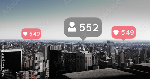 Image of social media reactions over cityscape