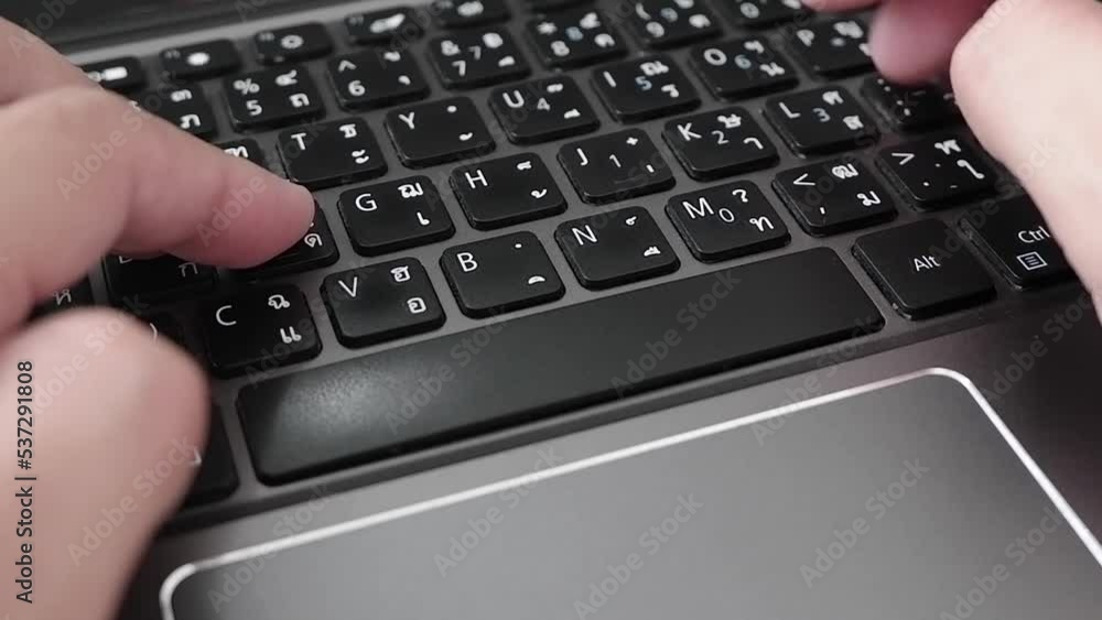 man's fingers typing keyboard black at laptop man's fingers typing keyboard black at laptop