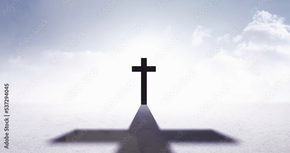 Image of christian cross with shadow over sky with clouds Image of christian cross with shadow over sky with clouds