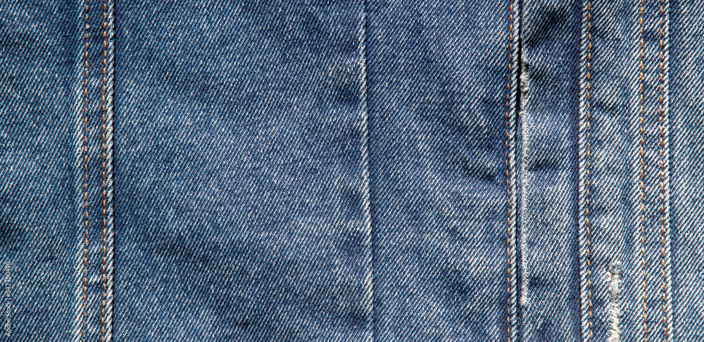 texture of blue jeans denim fabric wath seam background texture of blue jeans denim fabric wath seam background