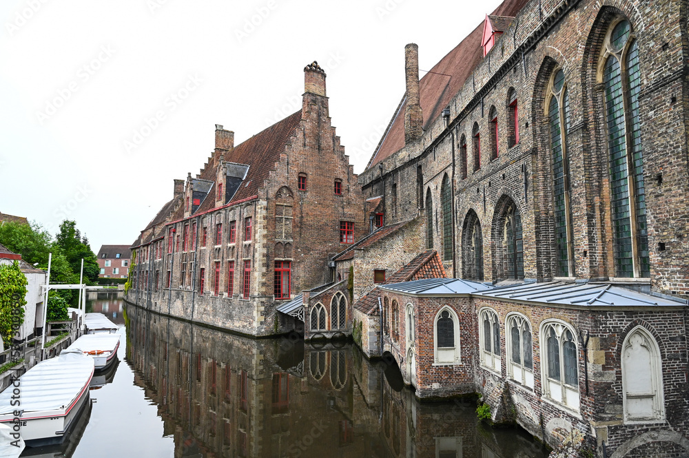 Bruges, Belgium: Historical buildings in city  centre. Buildings by the river. 
