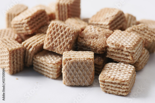 brown chocolate wafer roll on white 
