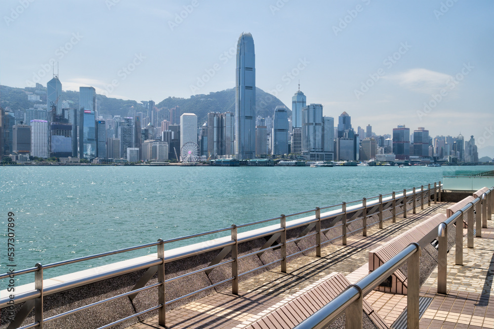 Viewing balcony with seating at Tsim Sha Tsui overlooking Victoria Harbour, Hong Kong.