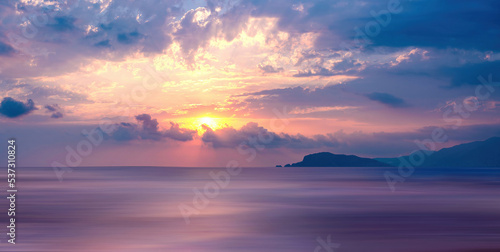 Very beautiful natural atmospheric seascape with purple sunset.