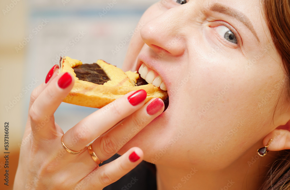 woman eating a sandwich woman eating a sandwich