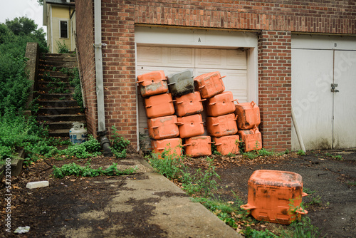 Piles of orange plastic cans, Governors Island, Manhattan, New York photo