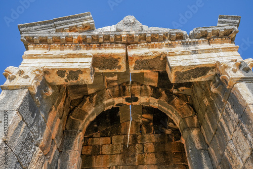 1st first one demircili imbrigon cilicia mausoleum front roof motif, roman empire, ion korihth, silifke mersin turkey photo