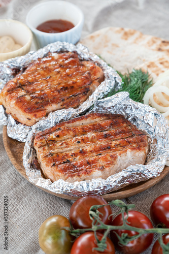 Grilled pork meat in foil w...