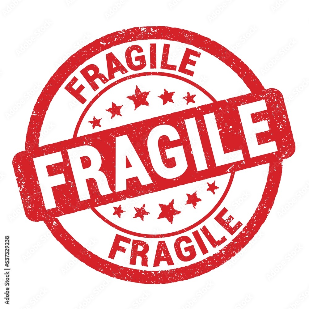 FRAGILE text written on red round stamp sign. FRAGILE text written on red round stamp sign.