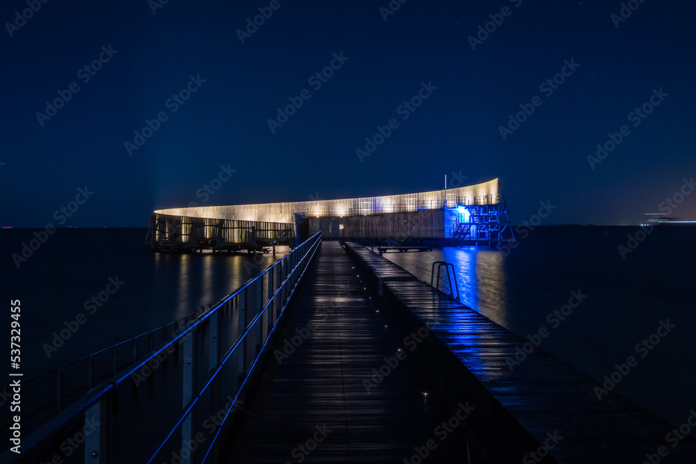 Copenhagen, Denmark The Kastrup Sea bath at night on the Oresund.