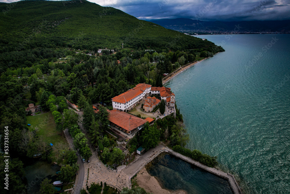 Monastery in the mountains overlooking the lake, top view