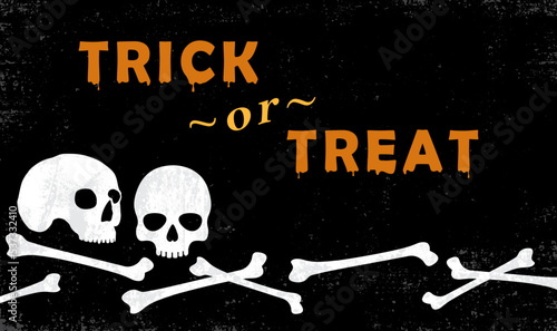 Skulls and bones design with Halloween text or copy space, in a cut paper style with textures
