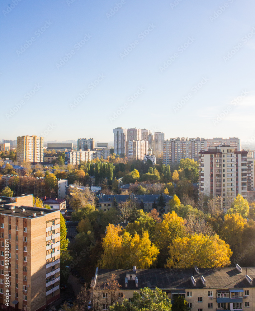 Obraz premium Facades of modern multi-storey buildings against a bright blue sky and a space for copying in the city Reutov, Moscow region, Russia