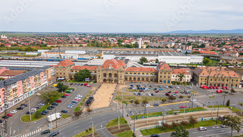 Aerial photography of the train station in Arad city, Romania. Photography was taken from a drone at a lower altitude capturing the train station building.