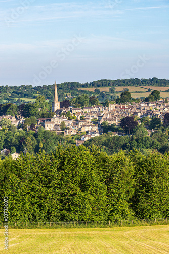 Early morning light on Midsummers Day (June 21st) on the Cotswold town of Painswick, Gloucestershire , England UK