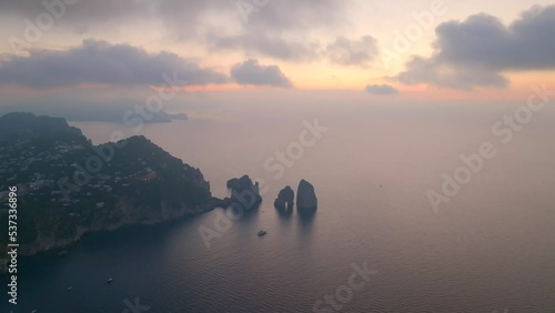 nuvole tra i faraglioni dell'isola di Capri. Italia, Golfo di Napoli.
Veduta aerea dell'escusiva isola più visitata al mondo. photo