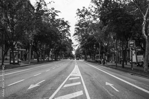 an empty city street photographed in a moment of respite from car traffic © Fernikon