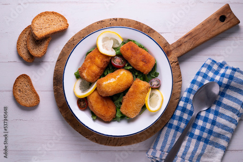 Fish croquettes. Traditional tapas of the coastal areas in Spain.