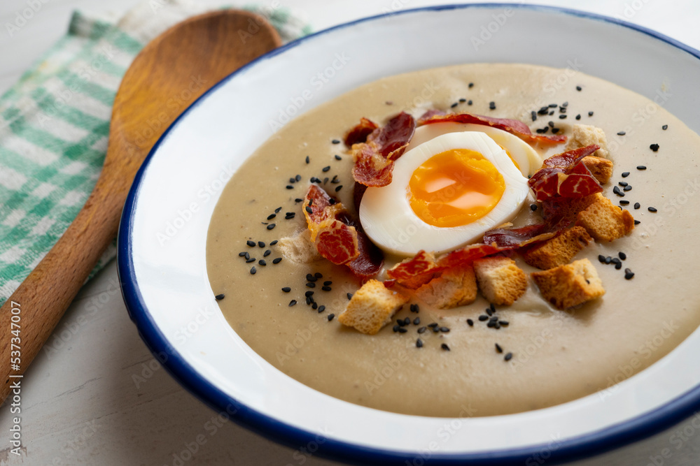Smoked aubergine cream with crispy Iberian ham and boiled egg. Smoked aubergine cream with crispy Iberian ham and boiled egg.