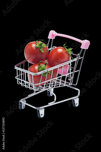 red tomatoes in a metal grocery basket