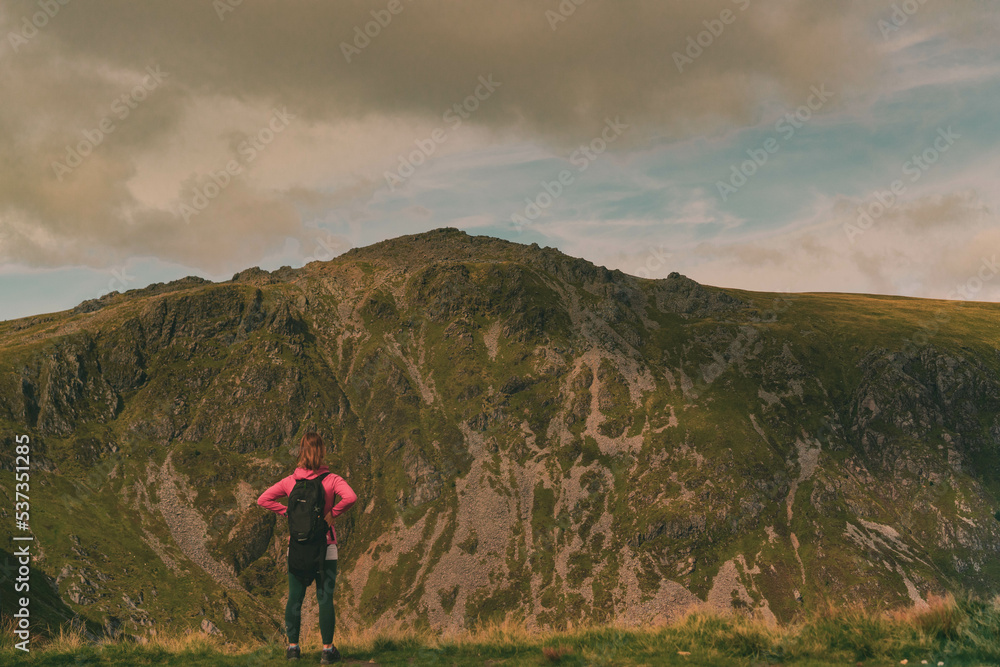 Girl on looking mountains, Wales