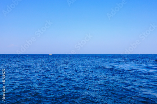 View of the open sea from the yacht. Background with selective focus © Iurii Gagarin