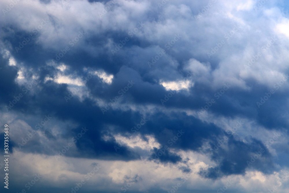 Large rain clouds in the sky over the sea. Large rain clouds in the sky over the sea.