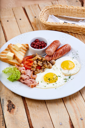 breakfast in the cafe on wooden background