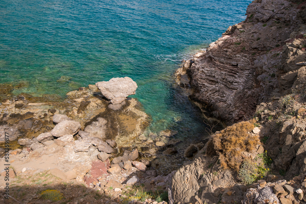 View on a rocky coast in the south of Crete, Greece at the Mediterranean Sea