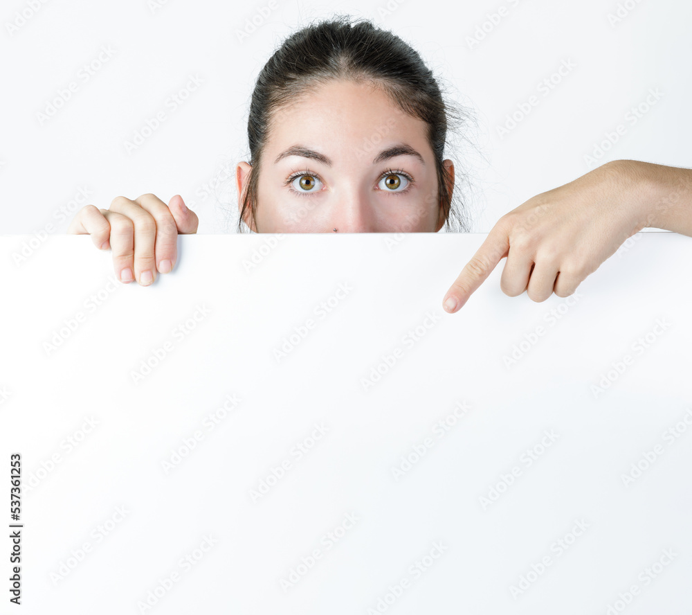 Young woman holding a blank white sign - Banner Mockup. Young woman holding a blank white sign - Banner Mockup.