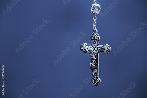 crucifix, macro photography, christian and catholic symbol, background with copyspace, image of jesus christ crucified. © RHJ