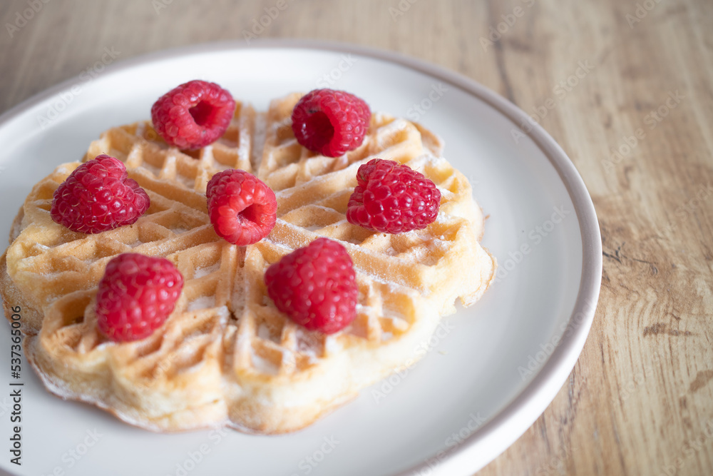Dessert waffles with raspberries and bananas Dessert waffles with raspberries and bananas