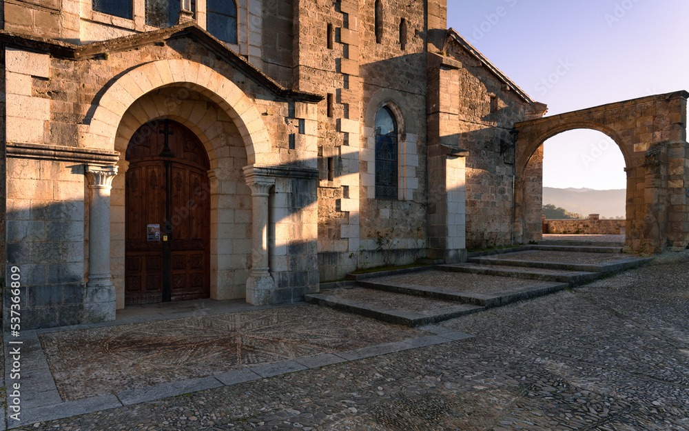 Old stone parish of San Vicente Martir of Romanesque origin in the picturesque medieval town of Frias, Burgos, Spain