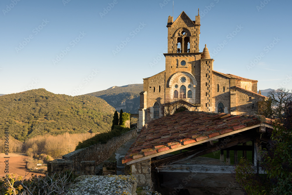 Old stone parish of San Vicente Martir of Romanesque origin in the picturesque medieval town of Frias, Burgos, Spain