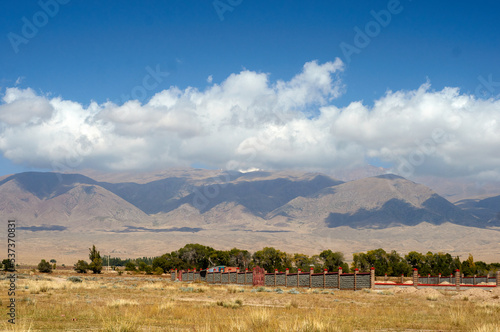 Kungoy Ala-Too or Kungey Alataw mountain view from Ysyk Kol and Tamchy village photo