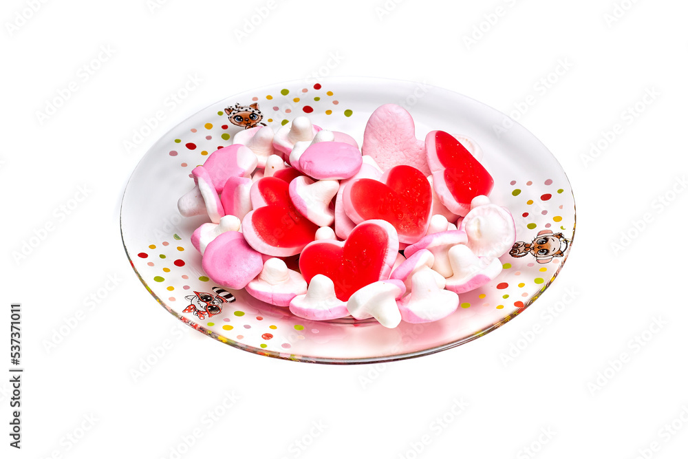 Candy red hearts on a plate isolated Candy red hearts on a plate isolated