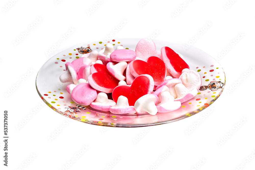 Candy red hearts on a plate isolated Candy red hearts on a plate isolated