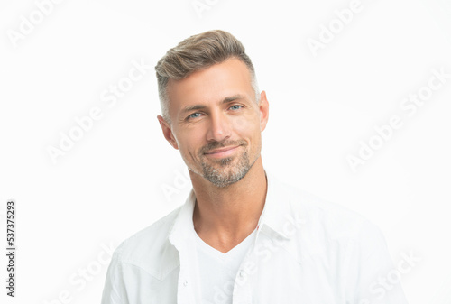 face of unshaven man smile in white shirt. portrait of unshaven man style. studio shot