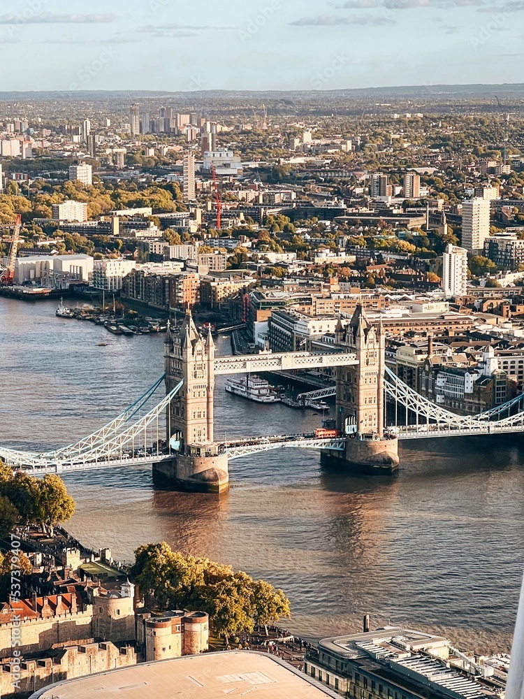 Aerial view on the Tower Bridge in central London with river Thames and bridge during sunset
