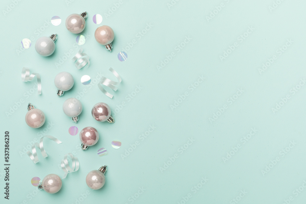 Christmas balls on color background, top view Christmas balls on color background, top view