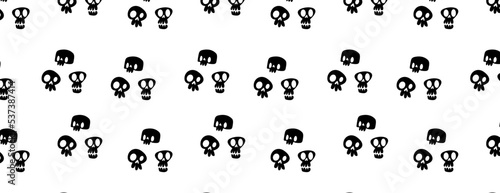 Seamless Halloween drawing with skulls on a white background