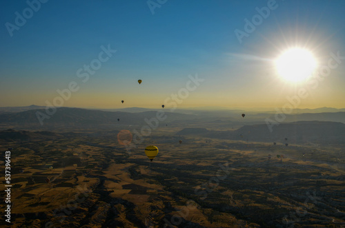 hot air balloon over the mountains