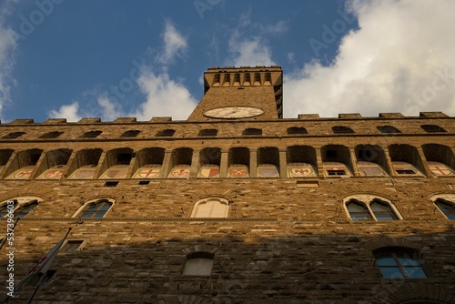 Low angle view of the Palazzo Vecchio located in the city of Florence, Italy photo