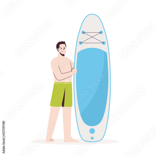 Young man stands in swimsuit next to sup. Stand up paddle.