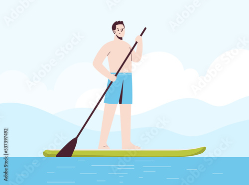 Young man is standing in swimsuit on sup . Stand up paddle.